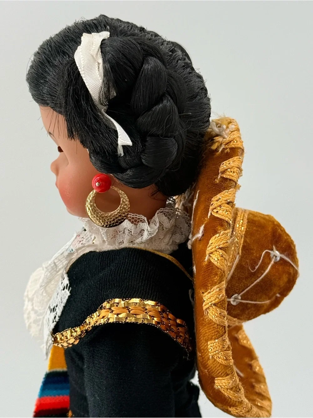 Traditional Black Cloth Doll with Yellow Sash and Lace Accents